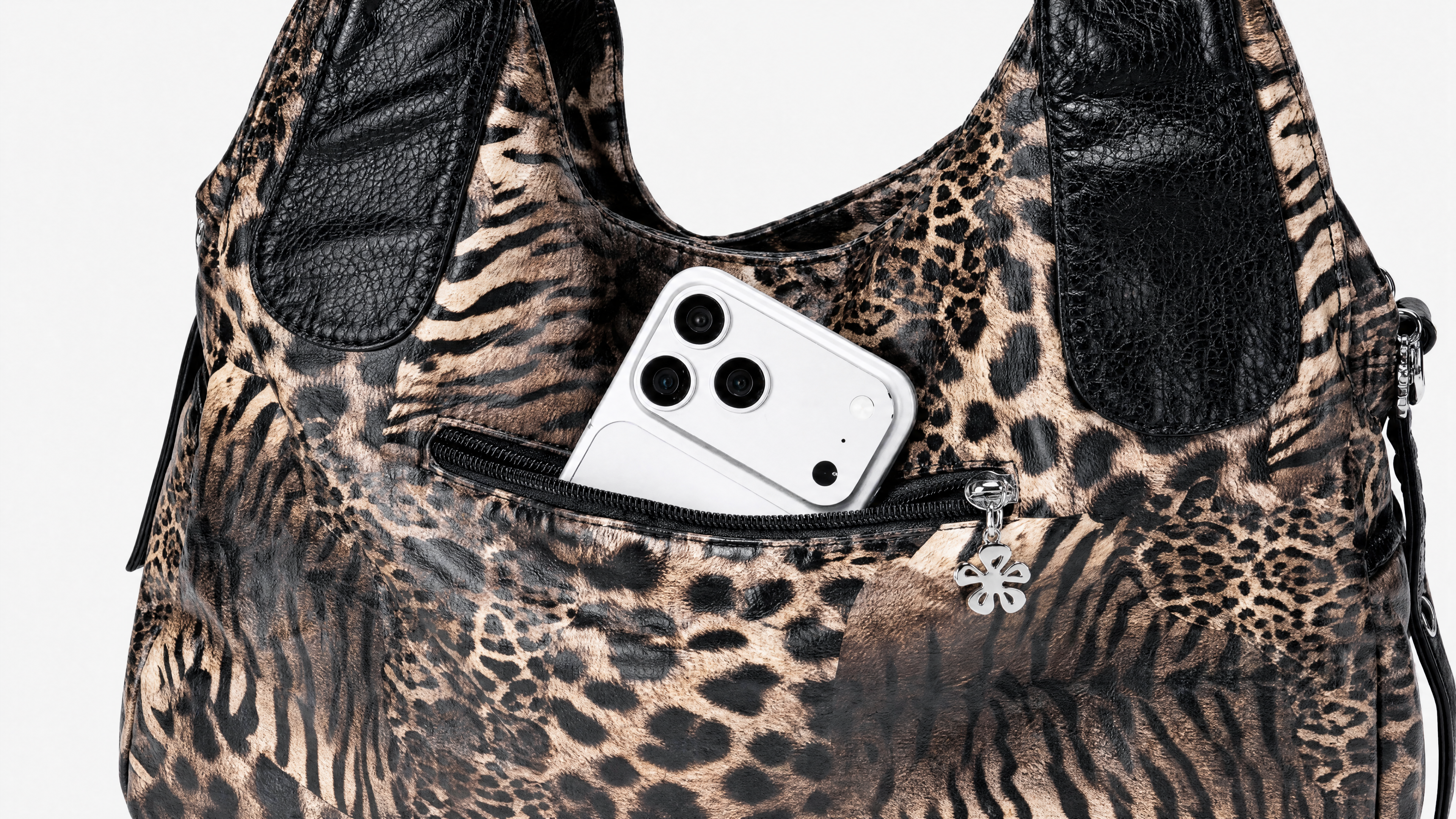 Phone sliding into the front zip pocket