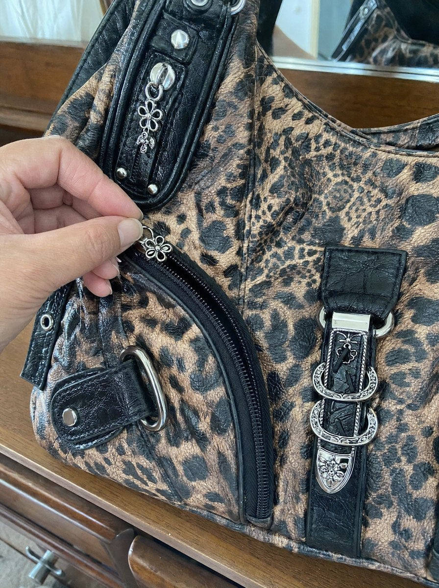 Close-up of the front zip pocket and buckle hardware
